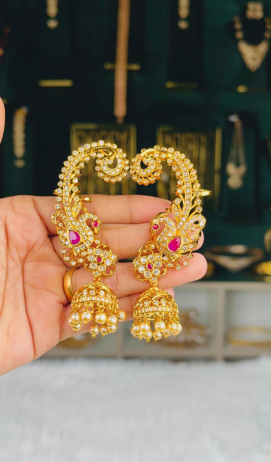 Swami gold-plated peacock ear cuffs